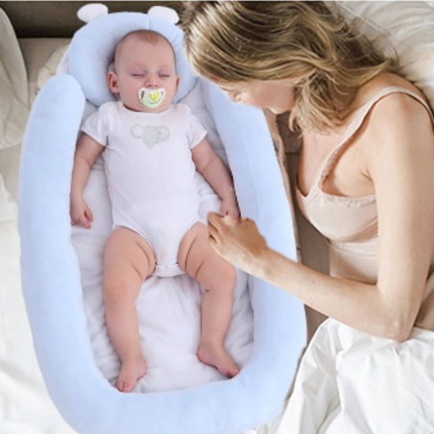 Réducteur-de-lit-bebe-lien