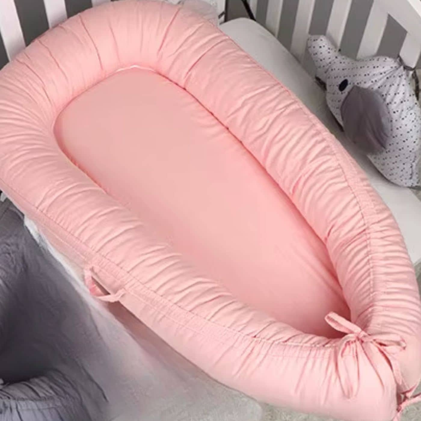 Reducteur-de-lit-bebe-maman