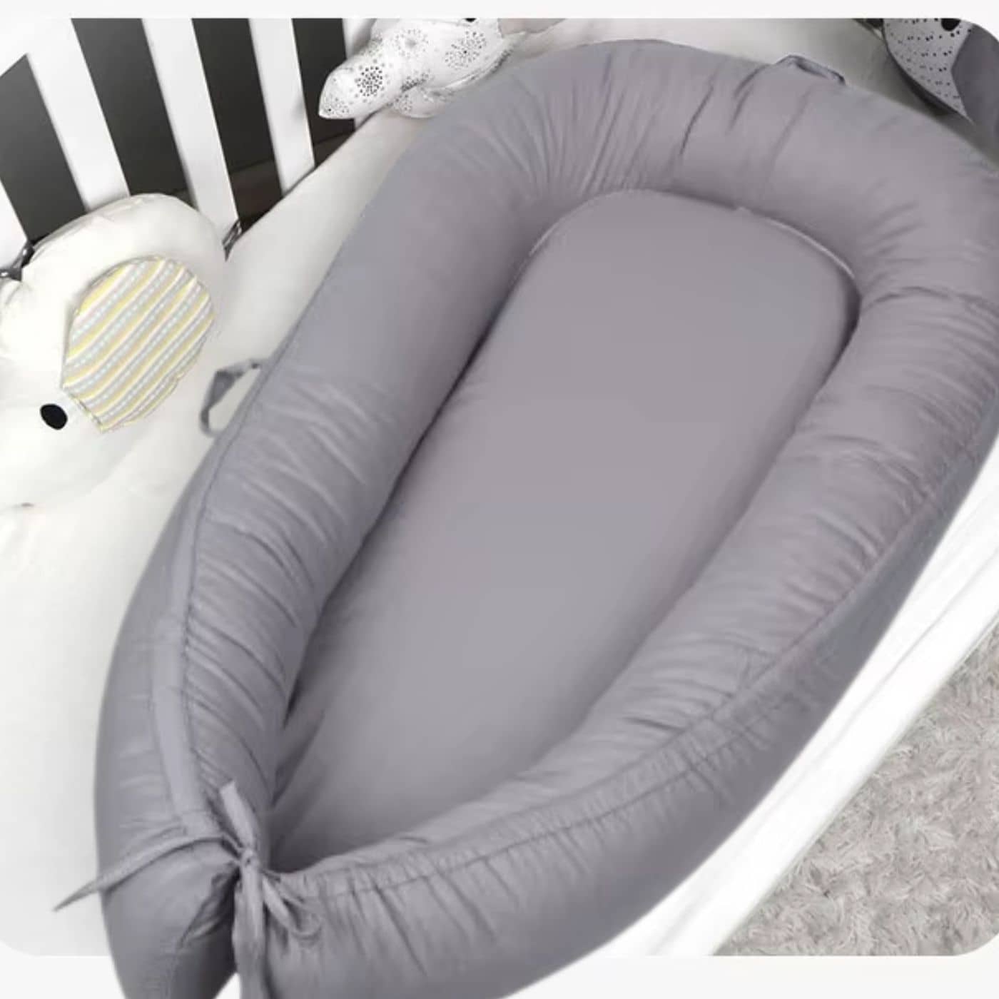 Reducteur-de-lit-bebe-mignon