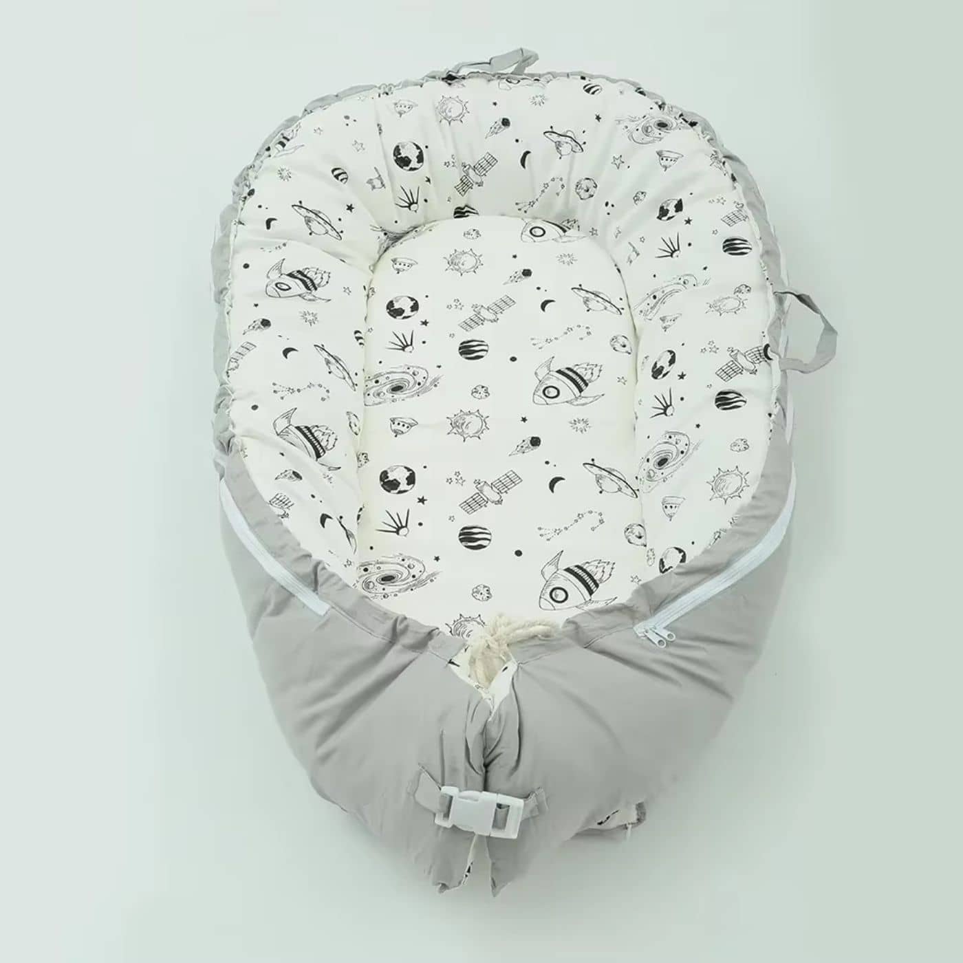 Reducteur-de-lit-bebe-sourire
